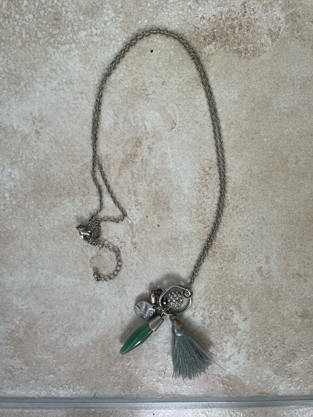 Silpada retired long silver bohemian charm necklace; 18” including tassel
